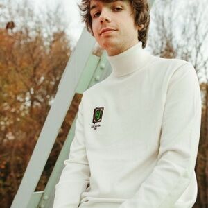 KARL JACOBS Enchantment Knit
Turtle Neck Sweater